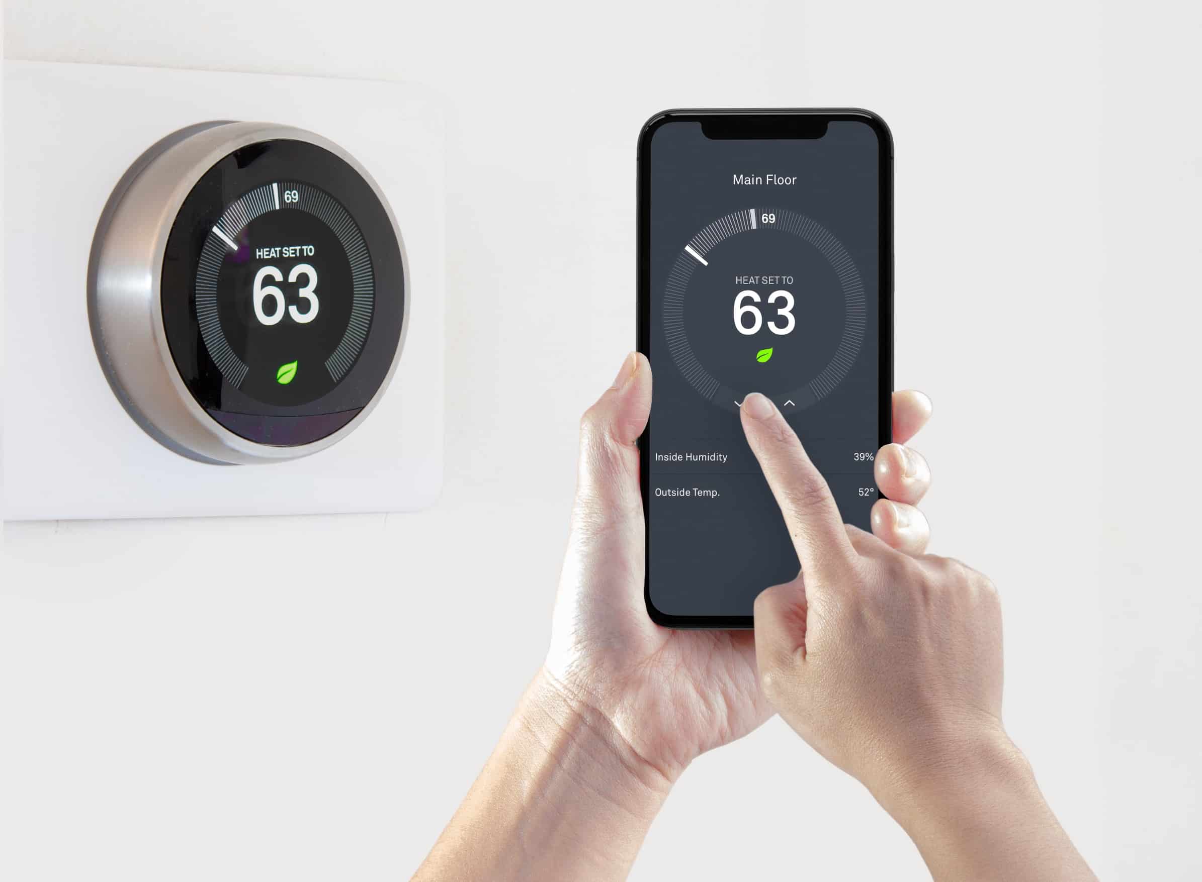 home automation solutions woman using phone for home automation