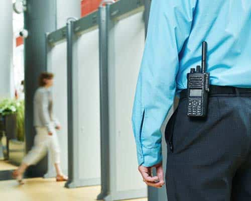 patrol services man with radio for patrol services
